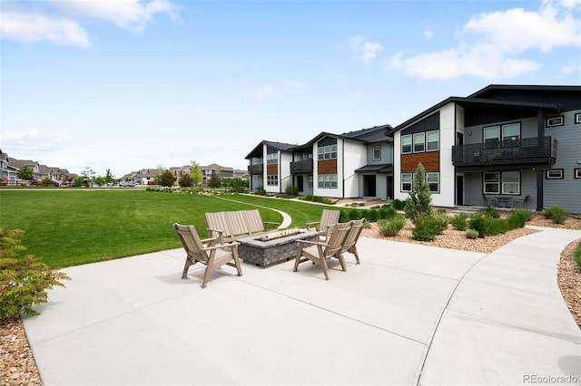 2080 Autumn Moon Dr Unit 5, Windsor, CO 80550 - view of patio / terrace featuring a residential view and a fire pit
