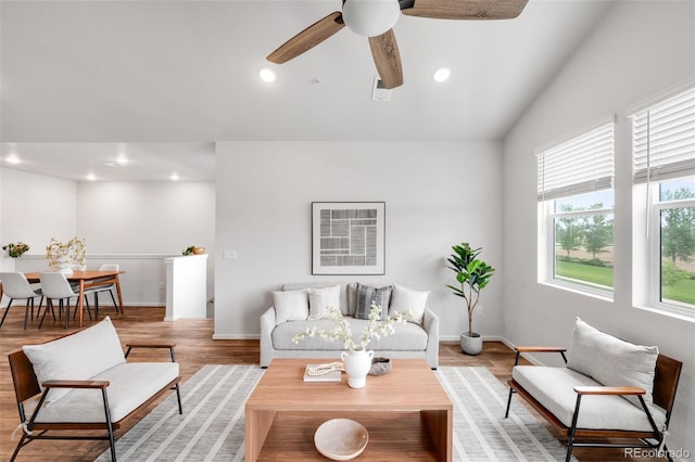 2080 Autumn Moon Dr Unit 5, Windsor, CO 80550 - living area featuring light wood-style flooring, recessed lighting, ceiling fan, lofted ceiling, and baseboards