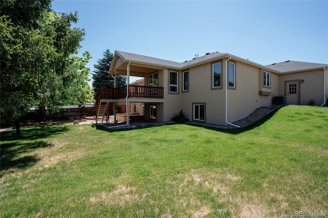 1131 N 4th St, Johnstown, CO 80534 - rear view of property featuring stairway, stucco siding, and a wooden deck