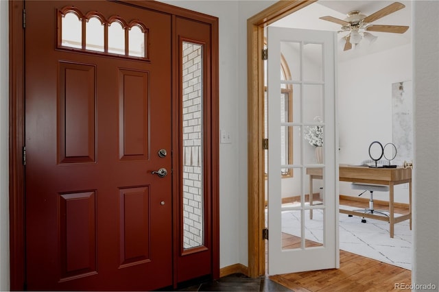1131 N 4th St, Johnstown, CO 80534 - foyer entrance featuring a ceiling fan and wood finished floors