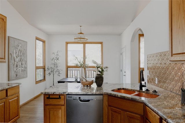1131 N 4th St, Johnstown, CO 80534 - kitchen with dishwasher, healthy amount of natural light, and light stone countertops