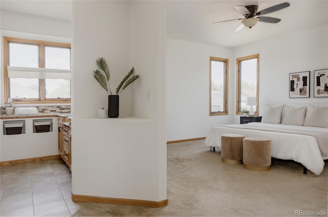 1131 N 4th St, Johnstown, CO 80534 - bedroom with multiple windows and a ceiling fan