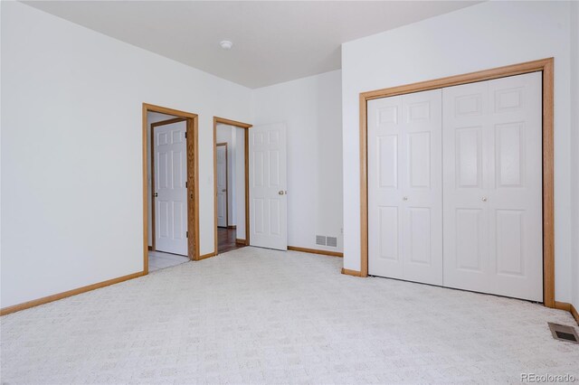 1131 N 4th St, Johnstown, CO 80534 - unfurnished bedroom with carpet and a closet