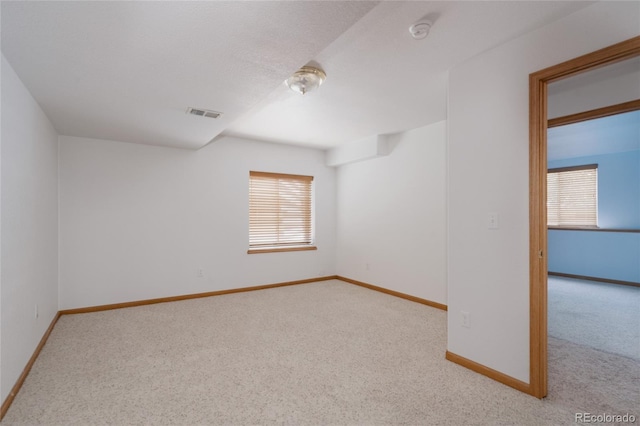 1131 N 4th St, Johnstown, CO 80534 - spare room with carpet floors and a smoke detector