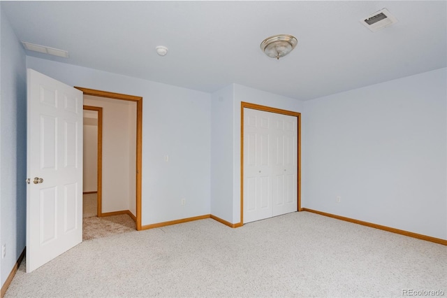 1131 N 4th St, Johnstown, CO 80534 - unfurnished bedroom with light carpet and a closet