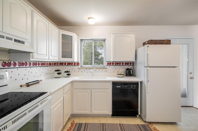 1270 Berea Dr, Boulder, CO 80305 - kitchen with white appliances, a sink, white cabinetry, under cabinet range hood, and glass insert cabinets