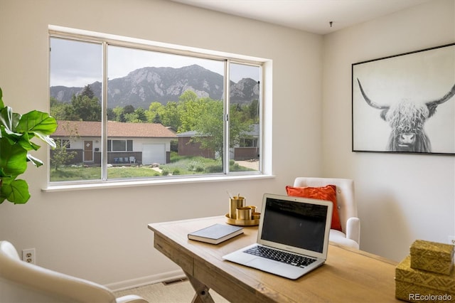 1270 Berea Dr, Boulder, CO 80305 - office with healthy amount of natural light, a mountain view, and baseboards