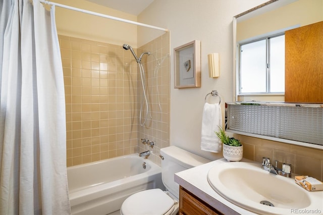 1270 Berea Dr, Boulder, CO 80305 - full bath featuring shower / bath combination with curtain, toilet, vanity, and tasteful backsplash