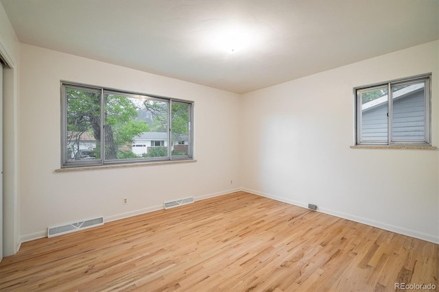 1270 Berea Dr, Boulder, CO 80305 - unfurnished room featuring healthy amount of natural light, wood finished floors, and baseboards