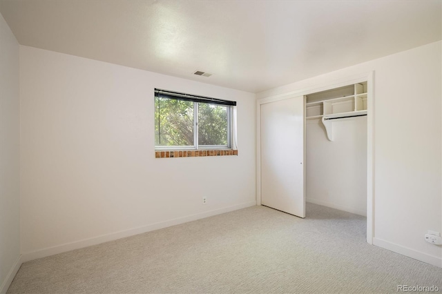 1270 Berea Dr, Boulder, CO 80305 - unfurnished bedroom featuring light carpet, baseboards, and a closet