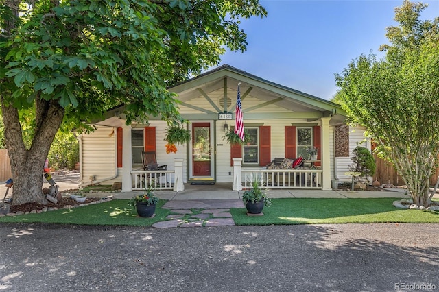6480 W 60th Ave, Arvada, CO 80003 - view of front of home with a porch