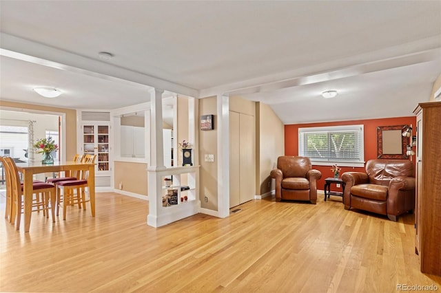 6480 W 60th Ave, Arvada, CO 80003 - living area featuring light wood-style floors and baseboards