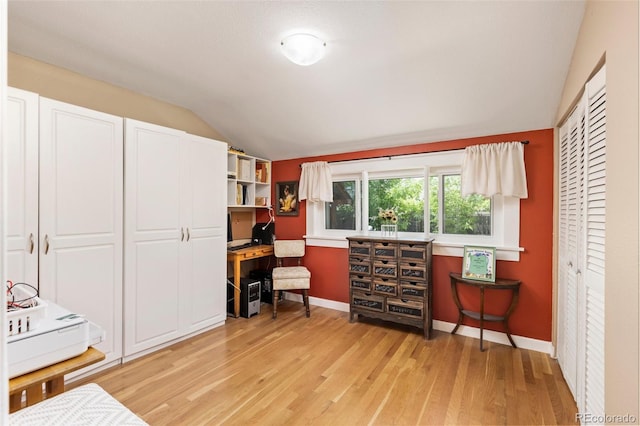 6480 W 60th Ave, Arvada, CO 80003 - home office featuring lofted ceiling, light wood-style flooring, and baseboards
