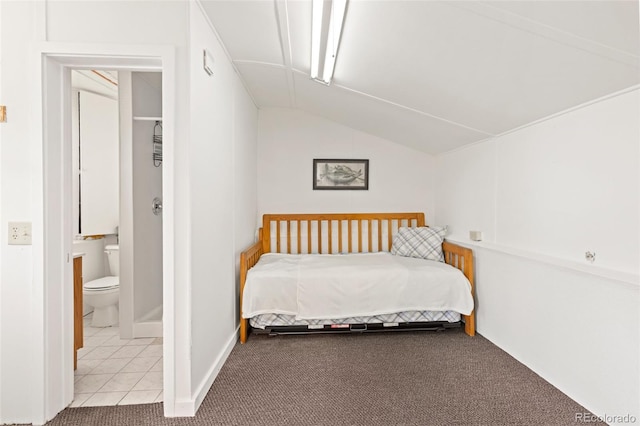 6480 W 60th Ave, Arvada, CO 80003 - carpeted bedroom featuring lofted ceiling and ensuite bath