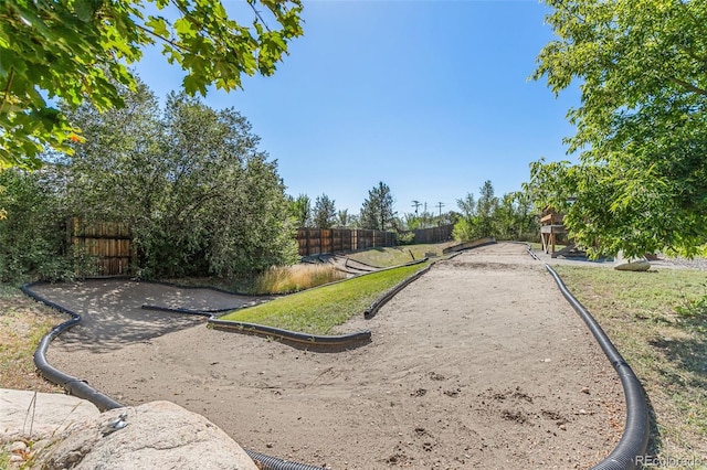 6480 W 60th Ave, Arvada, CO 80003 - view of community featuring a bocce ball area and fence