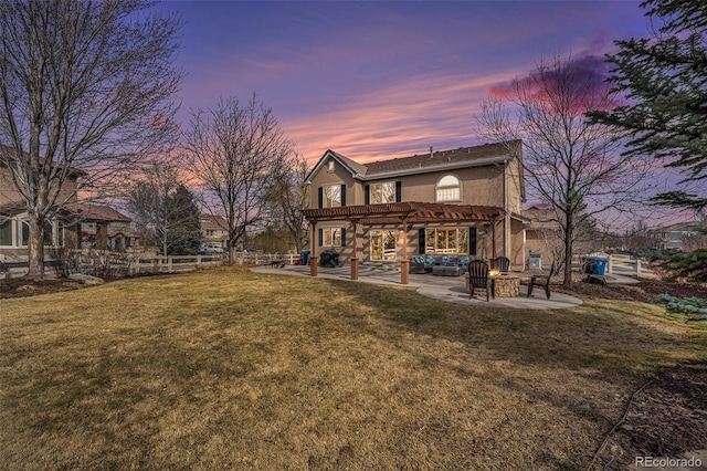 back of property at dusk with stucco siding, a lawn, outdoor lounge area, a patio area, and a pergola