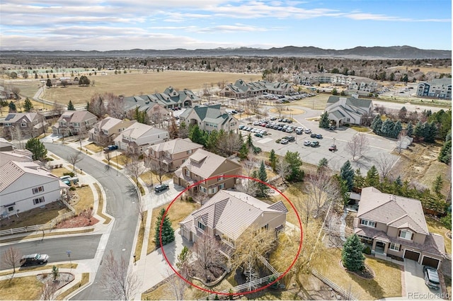 aerial view with a mountain view and a residential view