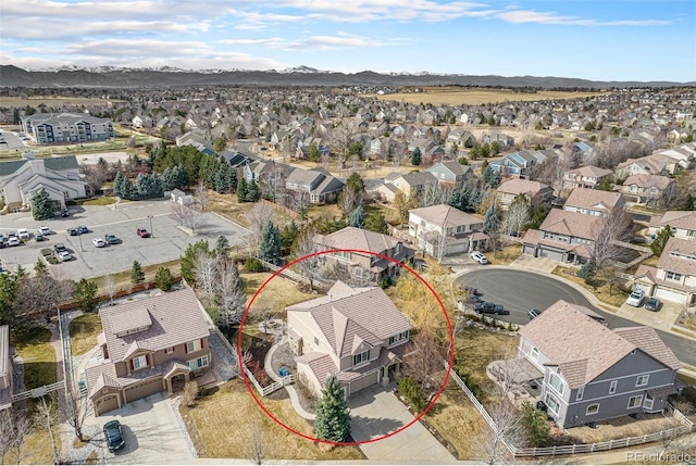 bird's eye view with a residential view and a mountain view