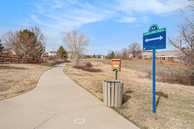 view of property's community with fence