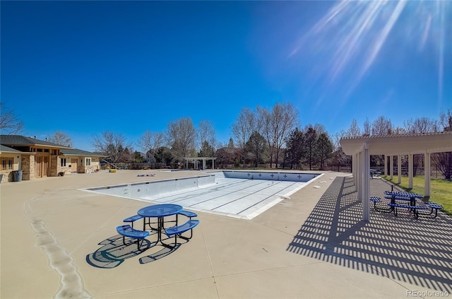 pool with a patio