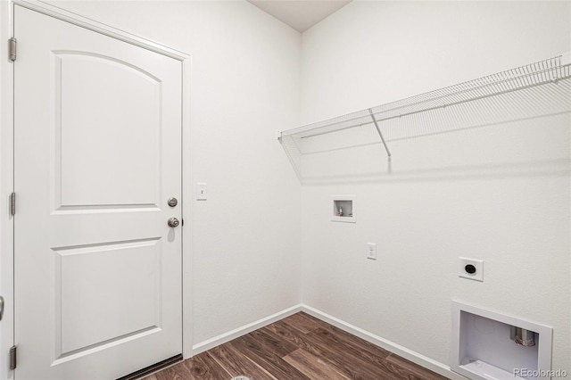 washroom featuring hookup for an electric dryer, hookup for a washing machine, and dark hardwood / wood-style flooring