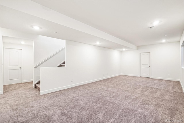 basement featuring carpet flooring