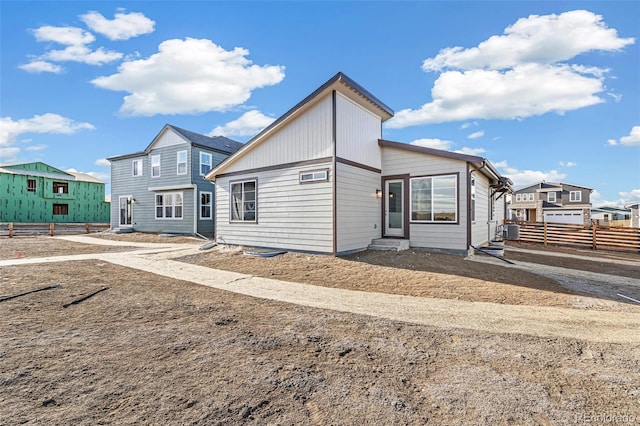 view of front of property with central AC unit