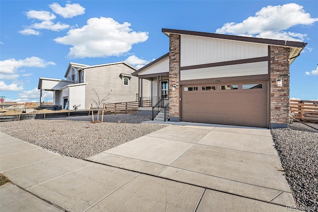 view of front of property with a garage