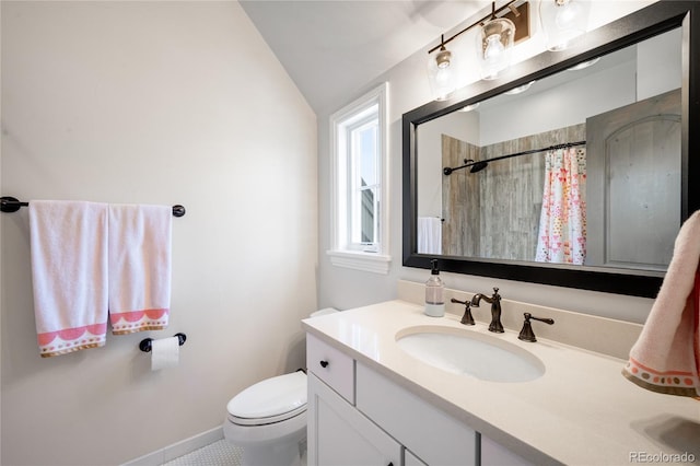bathroom featuring vanity, a shower with shower curtain, toilet, and lofted ceiling