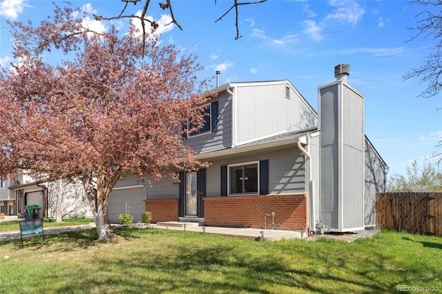4860 S Field Way, Littleton, CO 80123 - view of front of house featuring brick siding, a chimney, and a garage