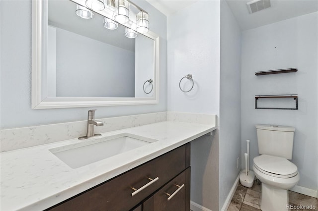 4860 S Field Way, Littleton, CO 80123 - half bath featuring baseboards and vanity