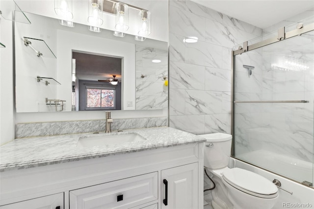 4860 S Field Way, Littleton, CO 80123 - full bathroom with vanity, shower / bath combination with glass door, and a ceiling fan