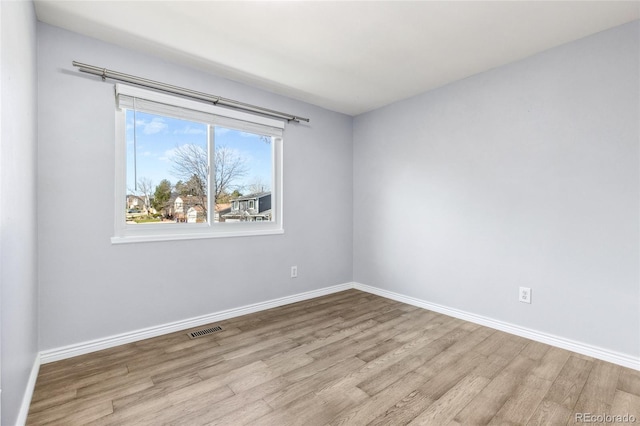 4860 S Field Way, Littleton, CO 80123 - spare room featuring wood finished floors