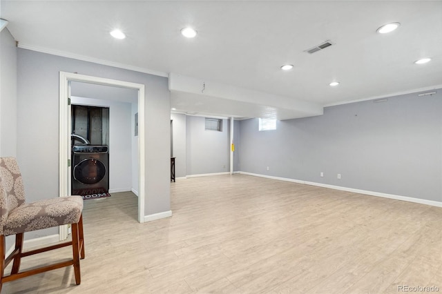 4860 S Field Way, Littleton, CO 80123 - finished below grade area with ornamental molding, light wood-type flooring, recessed lighting, and washer / clothes dryer