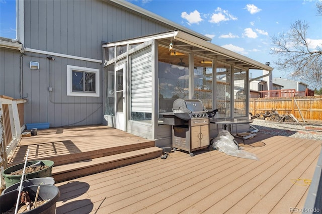 4860 S Field Way, Littleton, CO 80123 - wooden terrace featuring a sunroom and area for grilling
