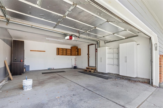 4860 S Field Way, Littleton, CO 80123 - garage featuring a garage door opener