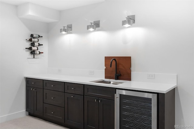 bathroom with beverage cooler and sink