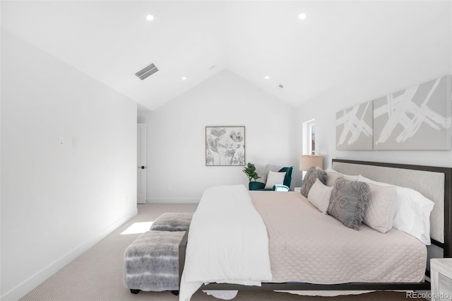 carpeted bedroom featuring lofted ceiling