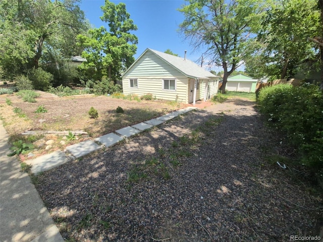 444 S Jersey St, Denver, CO 80224 - view of property exterior featuring dirt driveway
