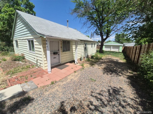 444 S Jersey St, Denver, CO 80224 - back of property with roof with shingles