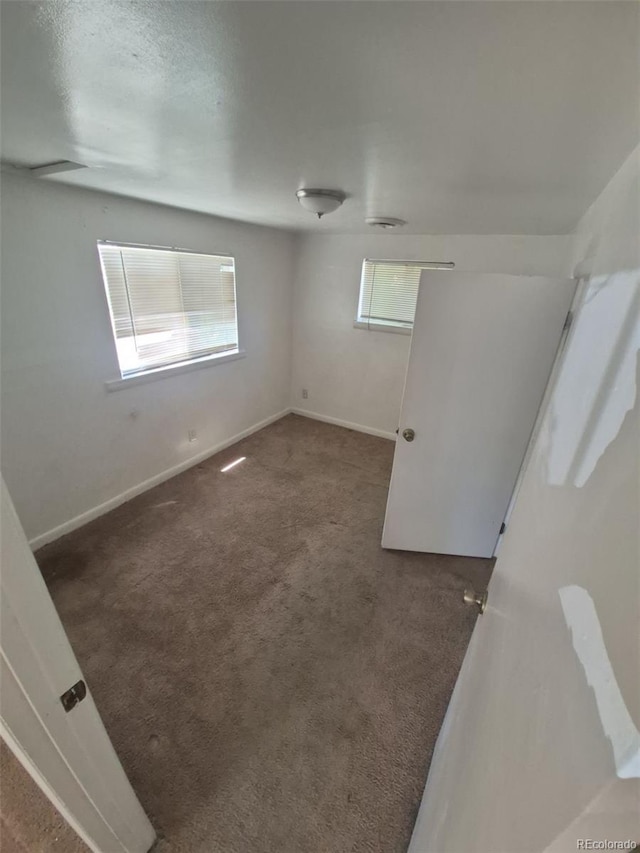 444 S Jersey St, Denver, CO 80224 - unfurnished room featuring carpet floors and baseboards