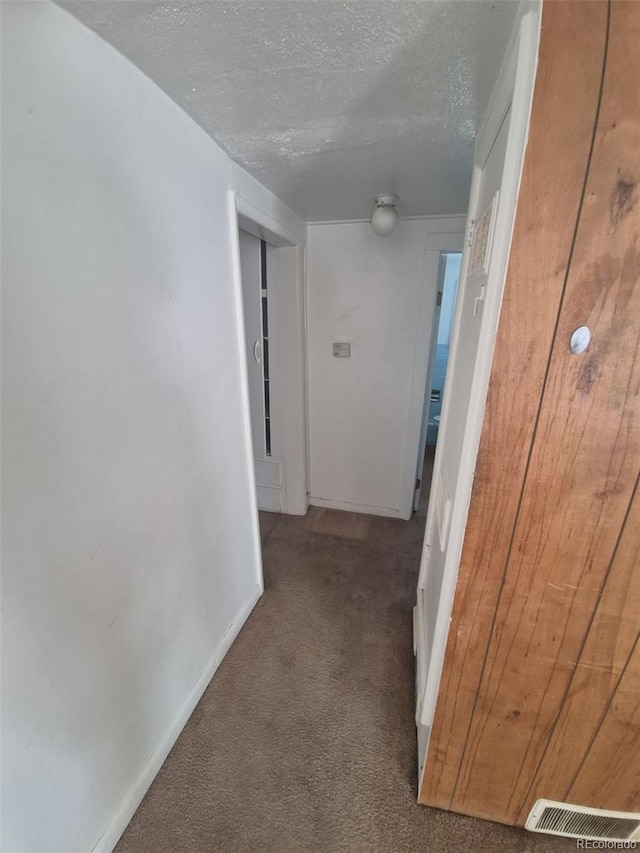 444 S Jersey St, Denver, CO 80224 - hall with carpet flooring, a textured ceiling, and baseboards