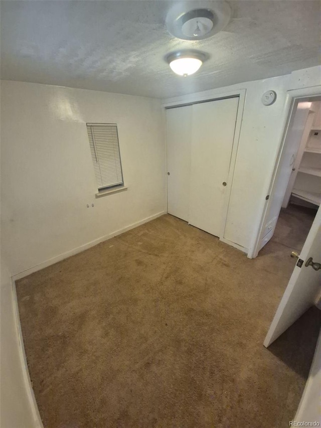 444 S Jersey St, Denver, CO 80224 - unfurnished bedroom with carpet floors, a closet, and baseboards