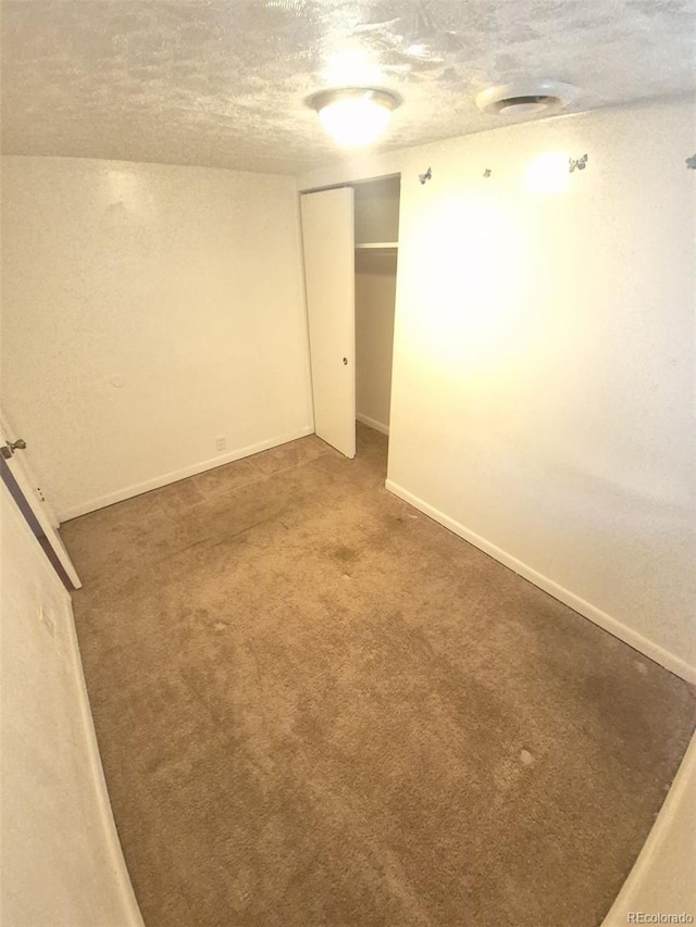 444 S Jersey St, Denver, CO 80224 - unfurnished bedroom featuring a textured ceiling, a closet, carpet, and baseboards