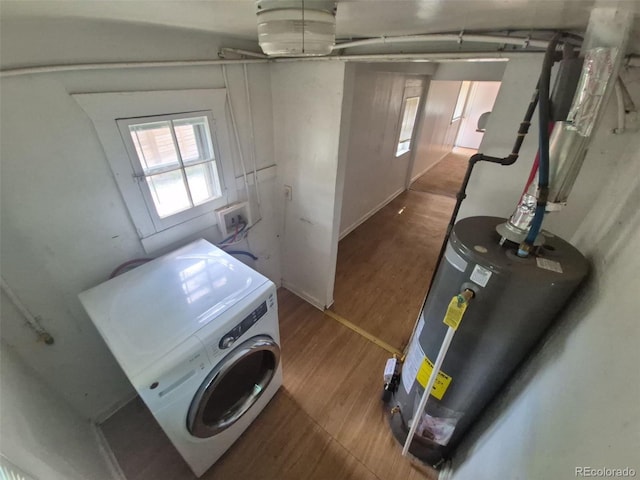 444 S Jersey St, Denver, CO 80224 - laundry room featuring washer / dryer, wood finished floors, and water heater