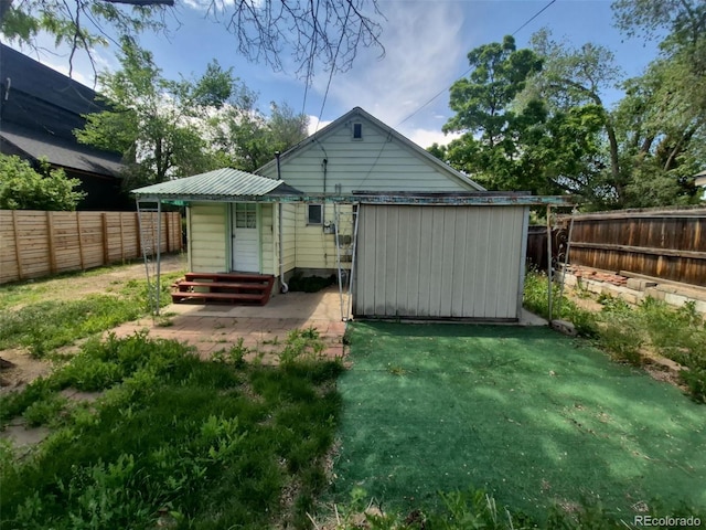 444 S Jersey St, Denver, CO 80224 - rear view of house featuring an outbuilding
