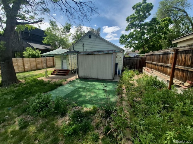 444 S Jersey St, Denver, CO 80224 - back of house featuring an outbuilding