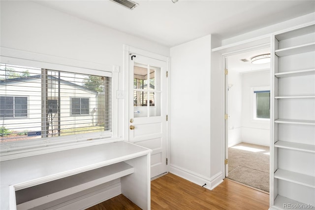 3375 W 37th Ave, Denver, CO 80211 - unfurnished office featuring wood finished floors and baseboards