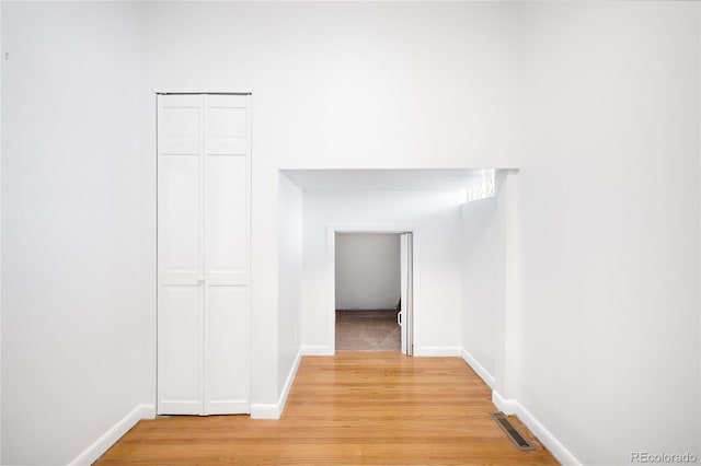 3375 W 37th Ave, Denver, CO 80211 - hallway featuring light wood-style floors and baseboards