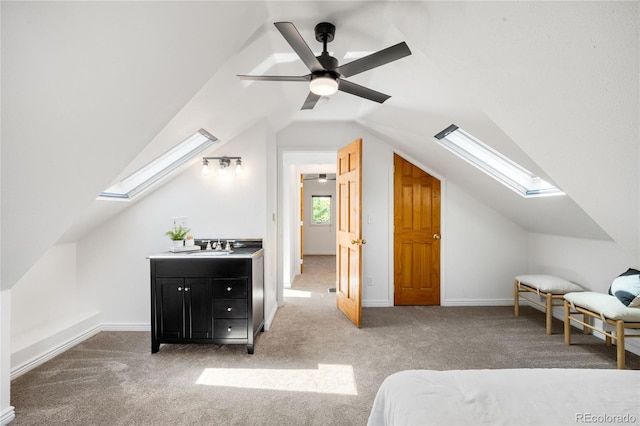 3375 W 37th Ave, Denver, CO 80211 - bedroom with a skylight, carpet, vaulted ceiling, and ceiling fan